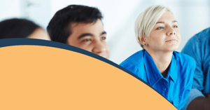 A group of contractors in an education session looking at the presenter